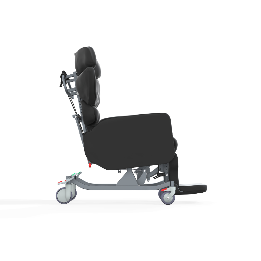 Side view of the Accora Configura® Advance Postural Tilt Chair, featuring a black cushioned seat, adjustable backrest and footrest, and large wheels for easy movement—ideal for postural care against a white background.