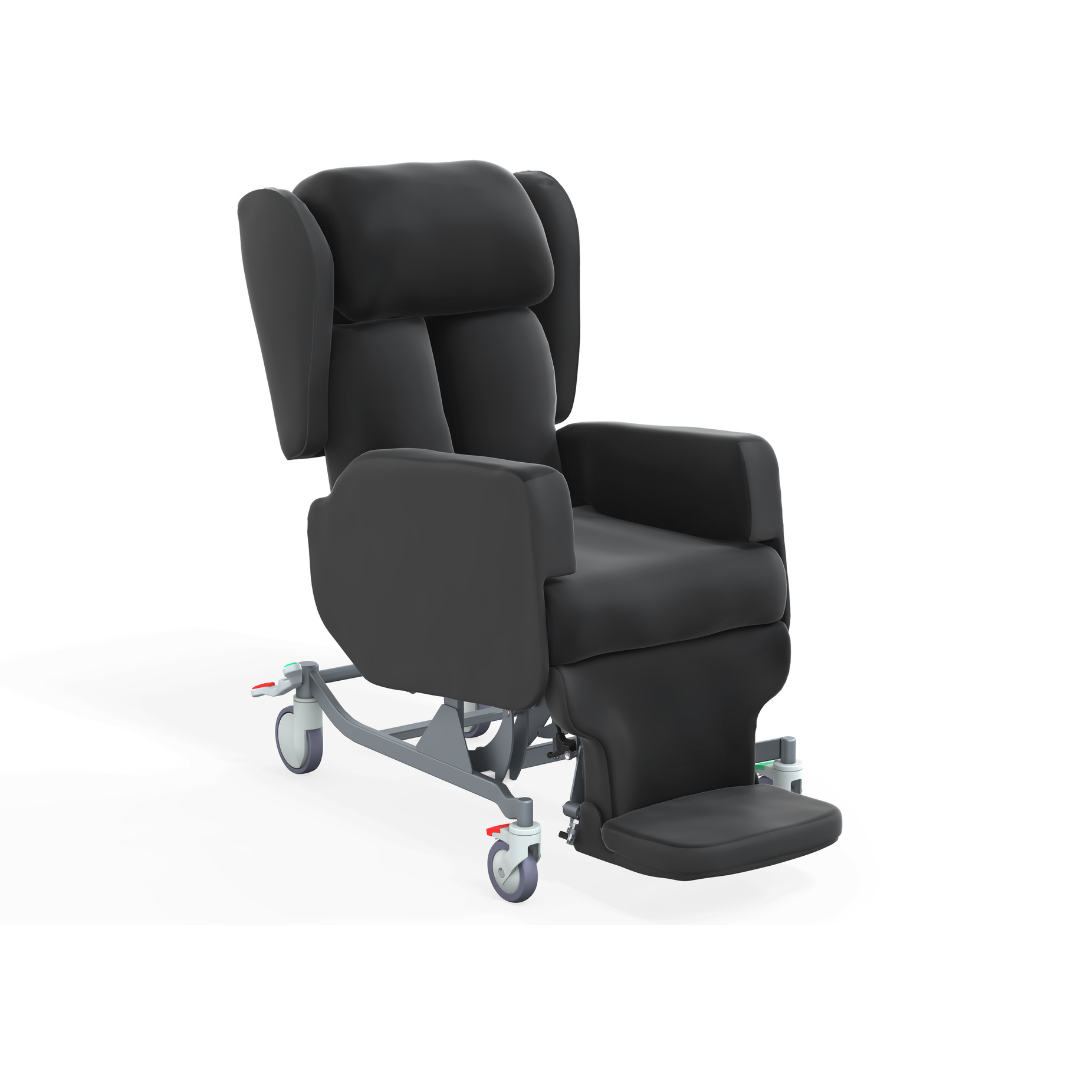 The Accora Configura® Advance Postural Tilt Chair is a black, padded recliner with large armrests, an adjustable footrest, and wheels, designed for patient comfort and mobility as a highly adaptable chair in healthcare settings.
