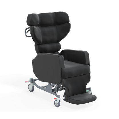 The Accora Configura® Advance Postural Tilt Chair, shown in black with armrests, head support, footrest, and wheels for easy mobility, offers adaptable comfort and support. Displayed against a white background.