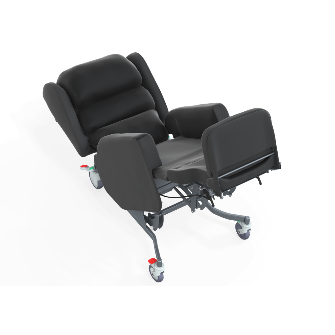 A black Accora Configura® Advance Postural Tilt Chair with elevated leg rests, wheels, and red brake levers is seen at an angle, partially reclined. It features armrests and offers adaptable support for secure positioning.