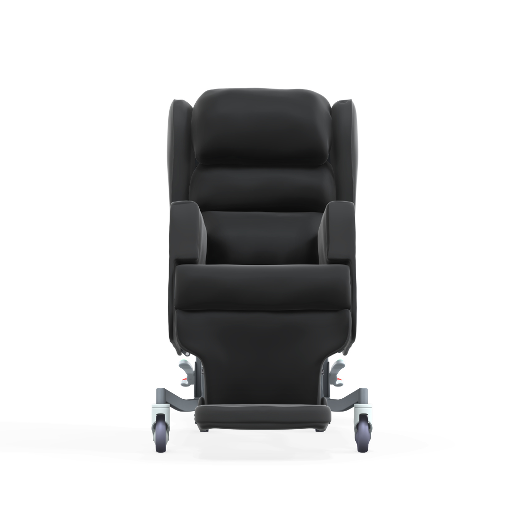 The Accora Configura® Advance Postural Tilt Chair is a black cushioned medical recliner with armrests and wheels, shown front-facing on a white background—an adaptable chair engineered for comfort and support.