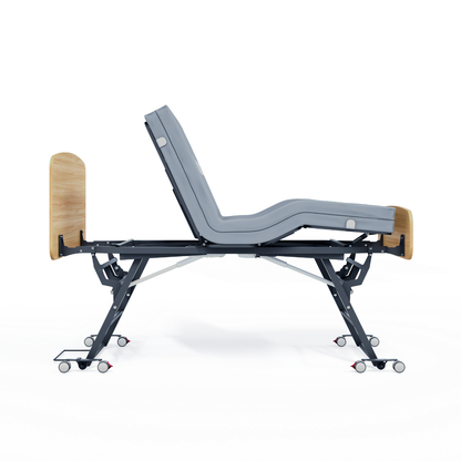 The Accora Contesa® FloorBed® Hi/Low Full Electric Bed features a gray mattress, wooden headboard and footboard, and a black metal frame on wheels, shown with raised backrest and knee-bend against a white background.