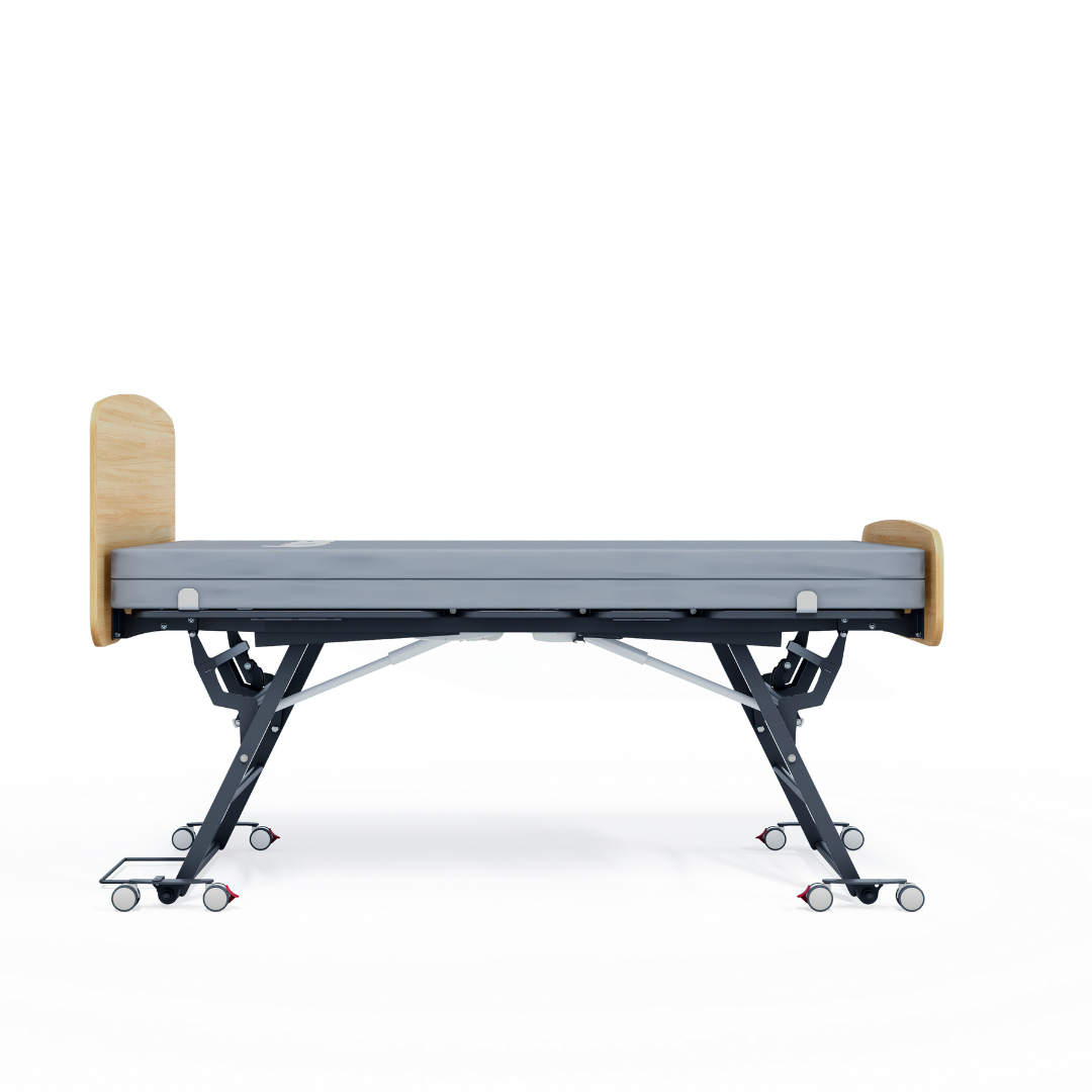 The Accora Contesa® FloorBed® Hi/Low Full Electric Bed is a modern hospital bed with a wooden headboard and footboard, metal frame, and wheels. Designed for fall prevention, it is shown isolated on a white background.