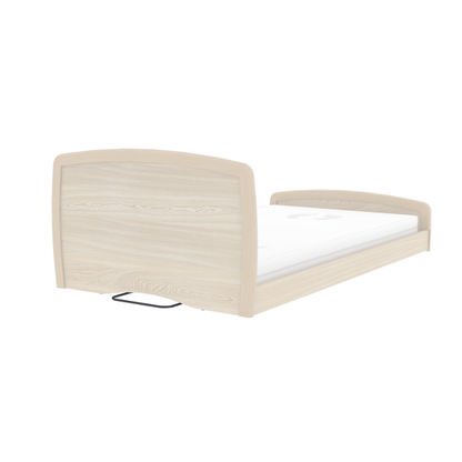 The Accora Empresa® Full Electric Bariatric FloorBed® features a light wood frame, low headboard, and footboard. Its plain white mattress enhances the minimalist look—ideal for modern bedrooms. Shown from an angled rear view against a white background.