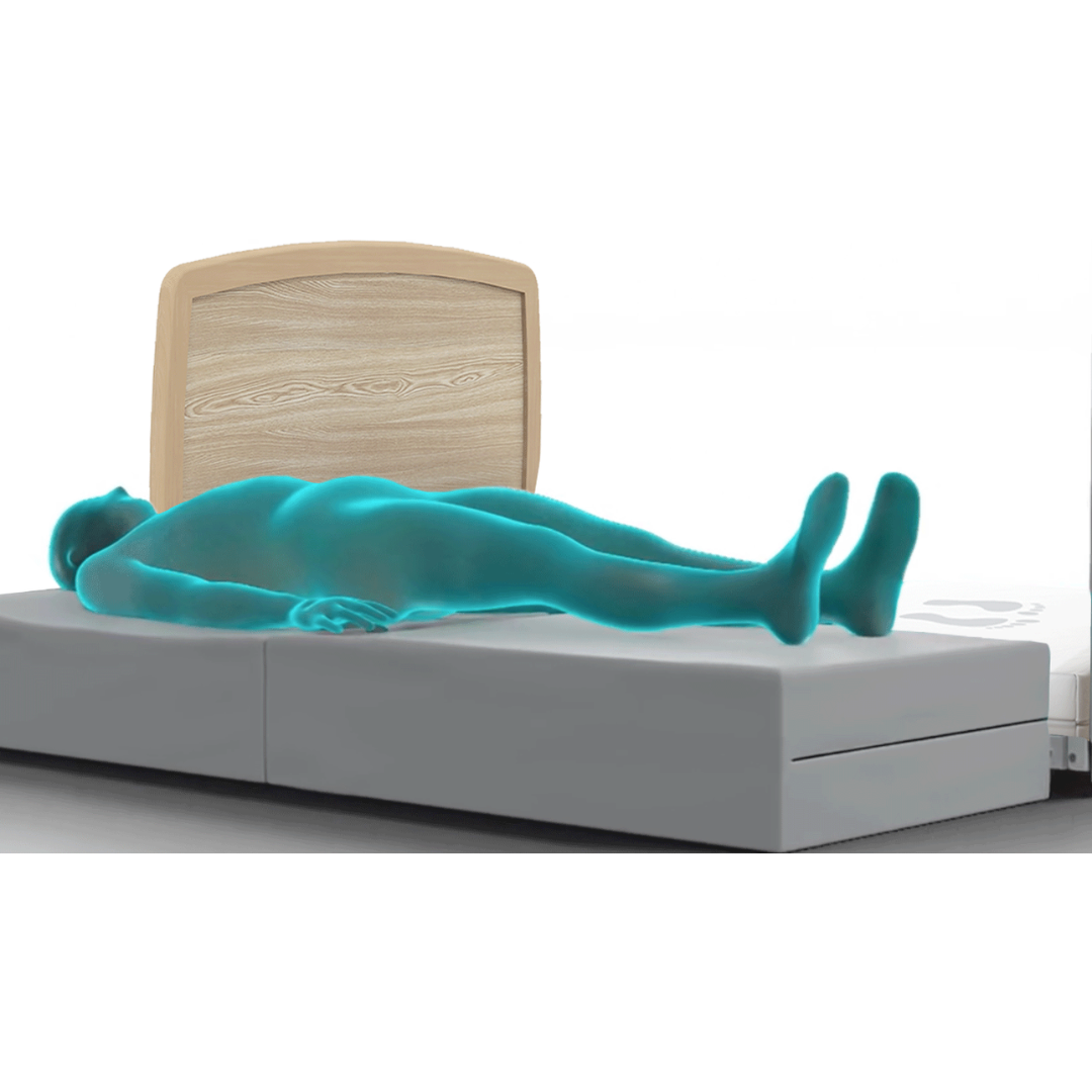 A blue, semi-transparent figure lies on a modern adjustable bed with a wooden headboard and gray base, next to the High Safety Mat For Bedside Falls—a high-impact absorbing mat designed for floor-level bed safety.