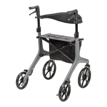 The Drive AeroCarbon Ultra-Lite Rollator is a modern gray walker featuring four large black wheels, ergonomic handles, a fabric seat, and an under-seat storage bag.