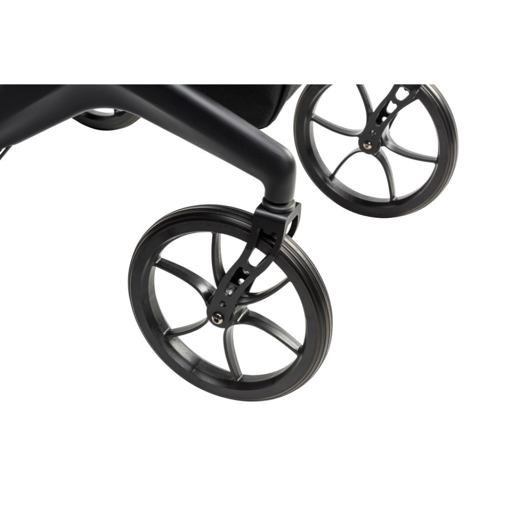 Close-up of two black wheels with slim spokes attached to the Drive AeroCarbon Ultra-Lite Rollator’s bottom frame, featuring a compact folding design, shown against a white background.