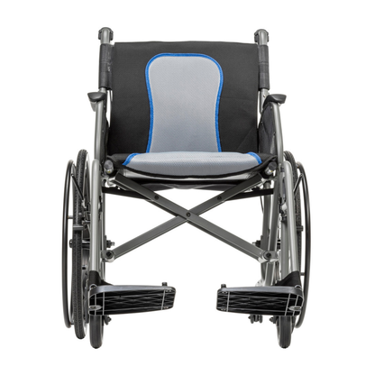 The Drive AeroFly™ Ultra-Lite Wheelchair with Companion Brakes features an ultra-light frame, black fabric, a gray and blue seat cushion, large rear wheels, and footrests—perfect as a travel wheelchair.