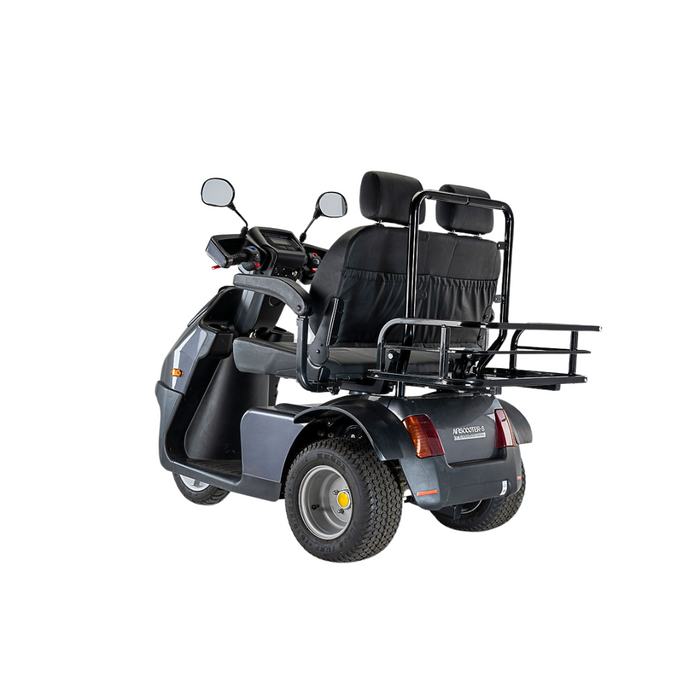 A two-seat black and gray mobility scooter, customizable with Afikim Electric Vehicle Accessories, includes side mirrors and a rear cargo rack. Designed for stability on three wheels, its showcased against a white background.