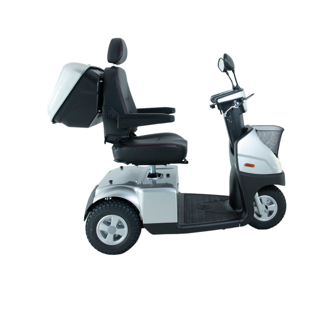 The Afikim Afiscooter C3 HD 3-Wheel Mobility Scooter features a cushioned seat, armrests, headrest, rear storage, front basket, and handlebar with mirrors for convenience in a mid-size side view.