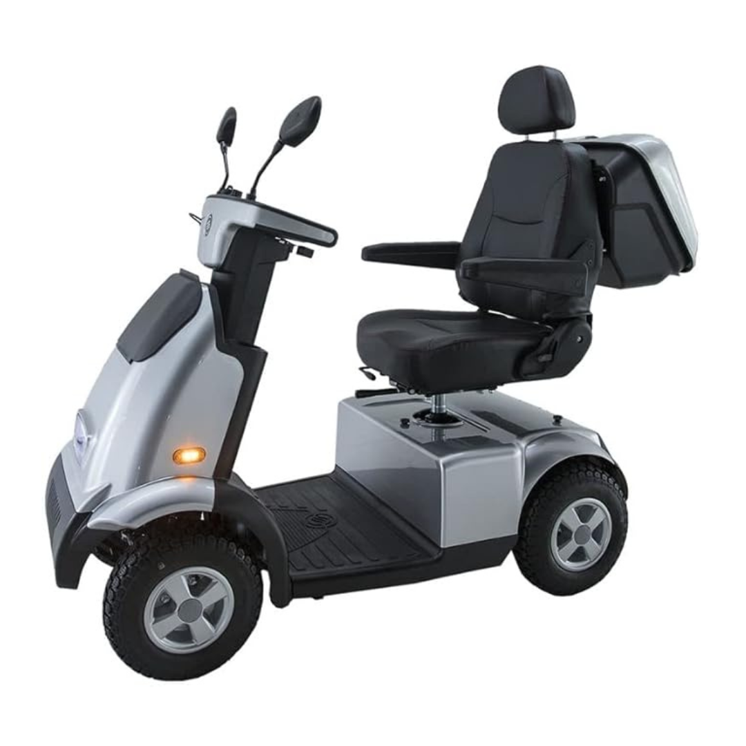The Afikim Afiscooter C4 HD 4-Wheel Mobility Scooter in sleek silver offers an adjustable seat, armrests, and a rear storage compartment. With handlebar mirrors and a streamlined design, it delivers comfortable performance.