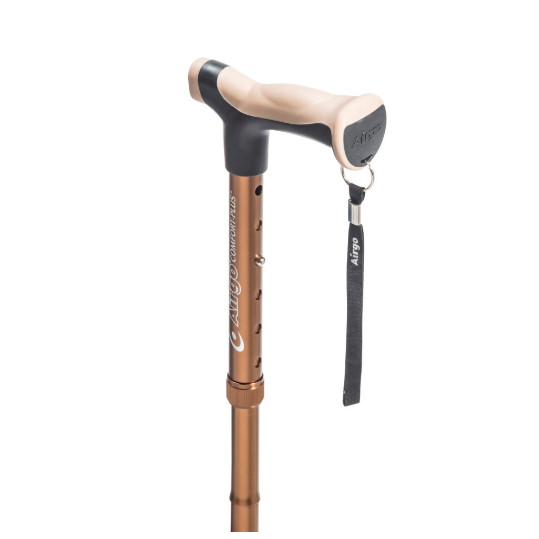 The Drive Airgo Comfort-Plus Folding Cane features a bronze finish, beige ergonomic handle designed for arthritis, black wrist strap, and “Airgo Comfort-Plus” branding on the shaft.
