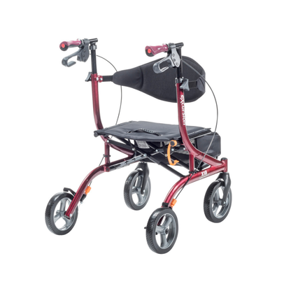 The Drive Airgo eXcursion X18 Lightweight Hemi-Height Rollator is red with black handles, a padded seat and backrest, under-seat storage pouch, and hand brakes. Shown on a plain white background.