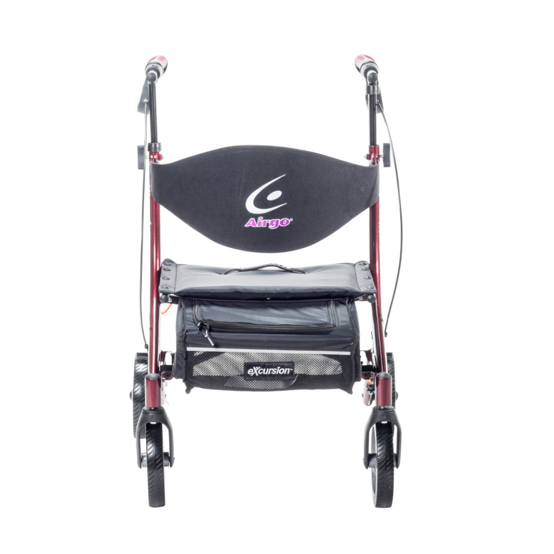 The Drive Airgo eXcursion X18 Lightweight Hemi-Height Rollator features a red frame, four wheels, hand brakes, black fabric seat and backrest labeled Airgo, plus a storage pouch under the seat marked Cushion for comfort and convenience.