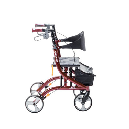 A Drive Airgo eXcursion X20 Lightweight Side-fold Rollator in red, featuring hand brakes, a padded seat, black backrest, and an under-seat storage bag, is shown in profile against a white background.