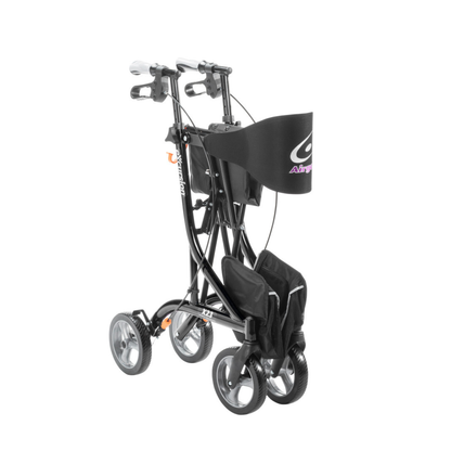 The Drive Airgo eXcursion X23 Lightweight Rollator for tall users is a foldable black rollator with four wheels, hand brakes, and a front storage bag, shown upright for compact transport or storage.