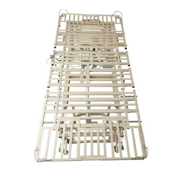 A beige Medline Alterra Maxx Long-Term Care Hi/Low Hospital Bed frame with metal slats (no mattress) is shown from above. Features include side rails, a 5-function hand pendant, adjustable width/length, electronic controls, and caster wheels.
