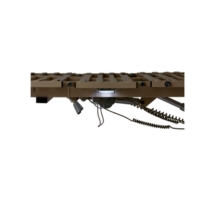 A close-up side view of a brown, slatted metal platform with adjustable width and length and coiled cables beneath, isolated on white—part of the Medline Alterra Maxx Long-Term Care Hi/Low Hospital Bed.