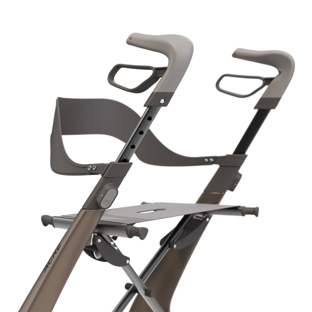A close-up side view of two ergonomic walking aids, featuring sturdy metal frames and adjustable height, highlights the Backrest For byACRE Overland Carbon Fiber Rollators with gray and beige handles against a white background.