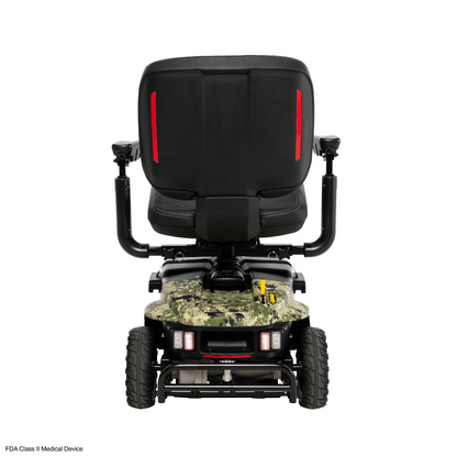 The Pride Baja® Bandit 4 Wheel Scooter has a camo-patterned base, black seat, and features two red vertical lights on the backrest. It boasts chunky all-terrain wheels and is powered by a reliable lithium-ion battery, making it ideal for off-road excursions in diverse environments.