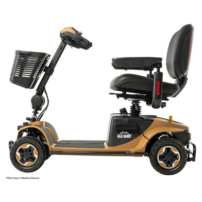 The Pride Baja® Bandit 4 Wheel Scooter features a side view of a tan body with full suspension, a black seat, front basket, and handlebars for steering. Equipped with a lithium-ion battery, it’s perfect for off-road adventures.