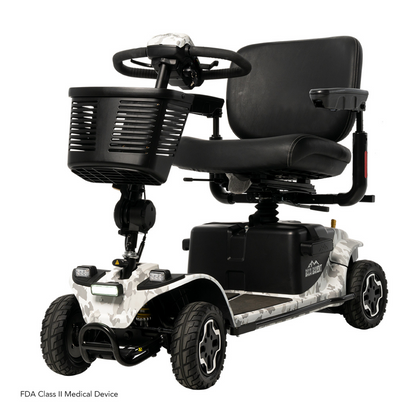 The Pride Baja® Bandit 4 Wheel Scooter features a camouflage base, black seat and armrests, front storage basket, full suspension for off-road comfort, four wheels, and dual lithium-ion batteries for extended power.