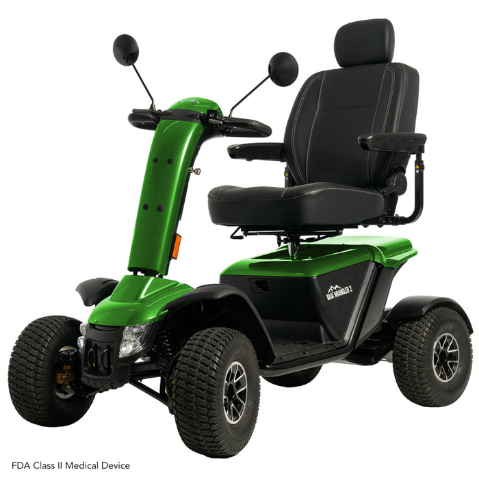 The Pride Baja® Wrangler® 2 Heavy Duty Outdoor Scooter is a green four-wheeled vehicle with CTS Suspension, boasting a large black cushioned seat, armrests, handlebars, side mirrors, and sturdy textured tires suited for rugged terrain.