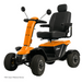 The Pride Baja® Wrangler® 2 Heavy Duty Outdoor Scooter features an orange design with a comfortable black seat, armrests, and rearview mirrors. It has four robust wheels for rugged terrain and is a durable FDA Class II Medical Device.
