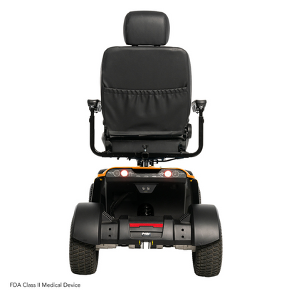 Rear view of the Pride Baja® Wrangler® 2 Heavy Duty Outdoor Scooter with a padded black chair and backrest, featuring a red bumper and large textured tires designed for rugged terrain durability. Bottom left text reads FDA Class II Medical Device.