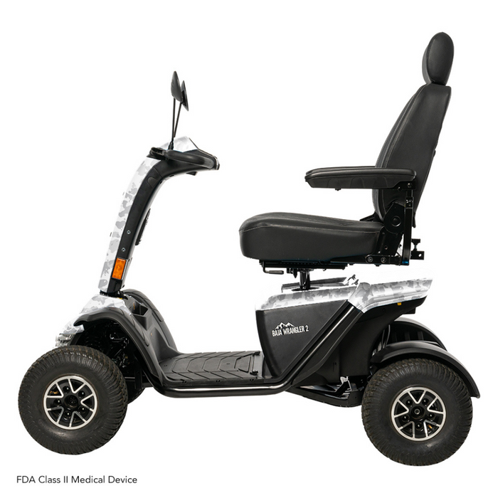 The Pride Baja® Wrangler® 2 Heavy Duty Outdoor Scooter, shown in a side view against a white background, features large wheels, a high backrest, and four-wheel stability. With its sturdy frame for rugged terrain, its an FDA Class II Medical Device ensuring durability and performance.