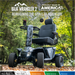 The Pride Baja® Wrangler® 2 Heavy Duty Outdoor Scooter, with its camo design and CTS Suspension, smoothly navigates forest trails. It features a comfortable seat, large tires, and a mounted device holder—a true adventure companion crafted in America by Baja Mobility.