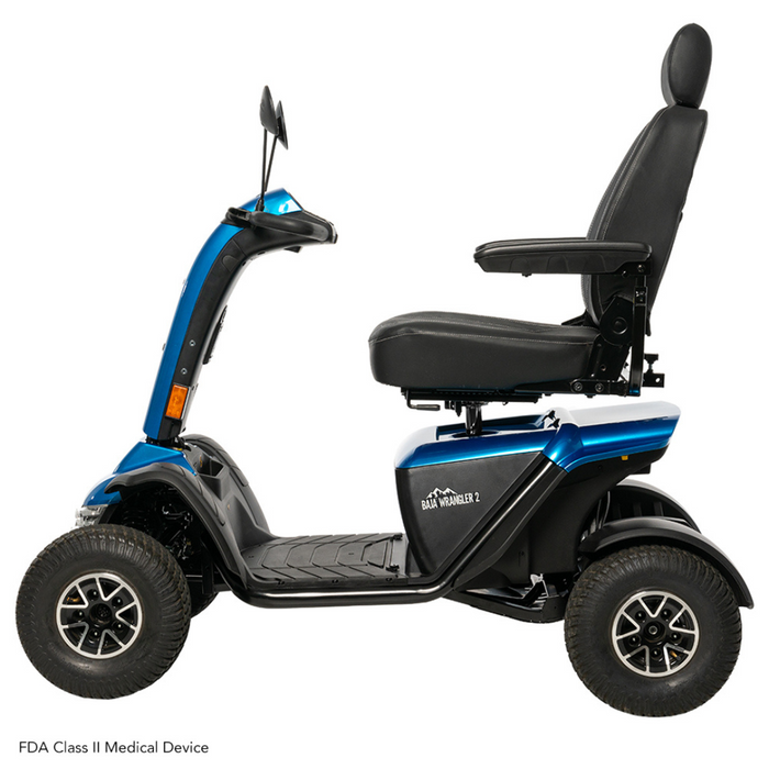 The Pride Baja® Wrangler® 2 Heavy Duty Outdoor Scooter features a sturdy four-wheel design, high backseat, armrests, and large wheels. With its rugged terrain capability and blue with black accents, its perfect for outdoor use.