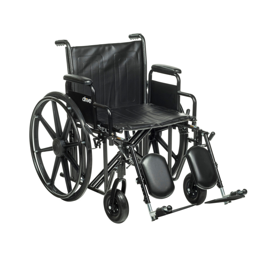The Drive Bariatric Sentra EC Heavy-Duty Wheelchair features a black frame, large rear wheels, small front wheels, padded armrests, elevated footrests, cushioned seat and backrest for comfort, and supports up to 450 lbs.