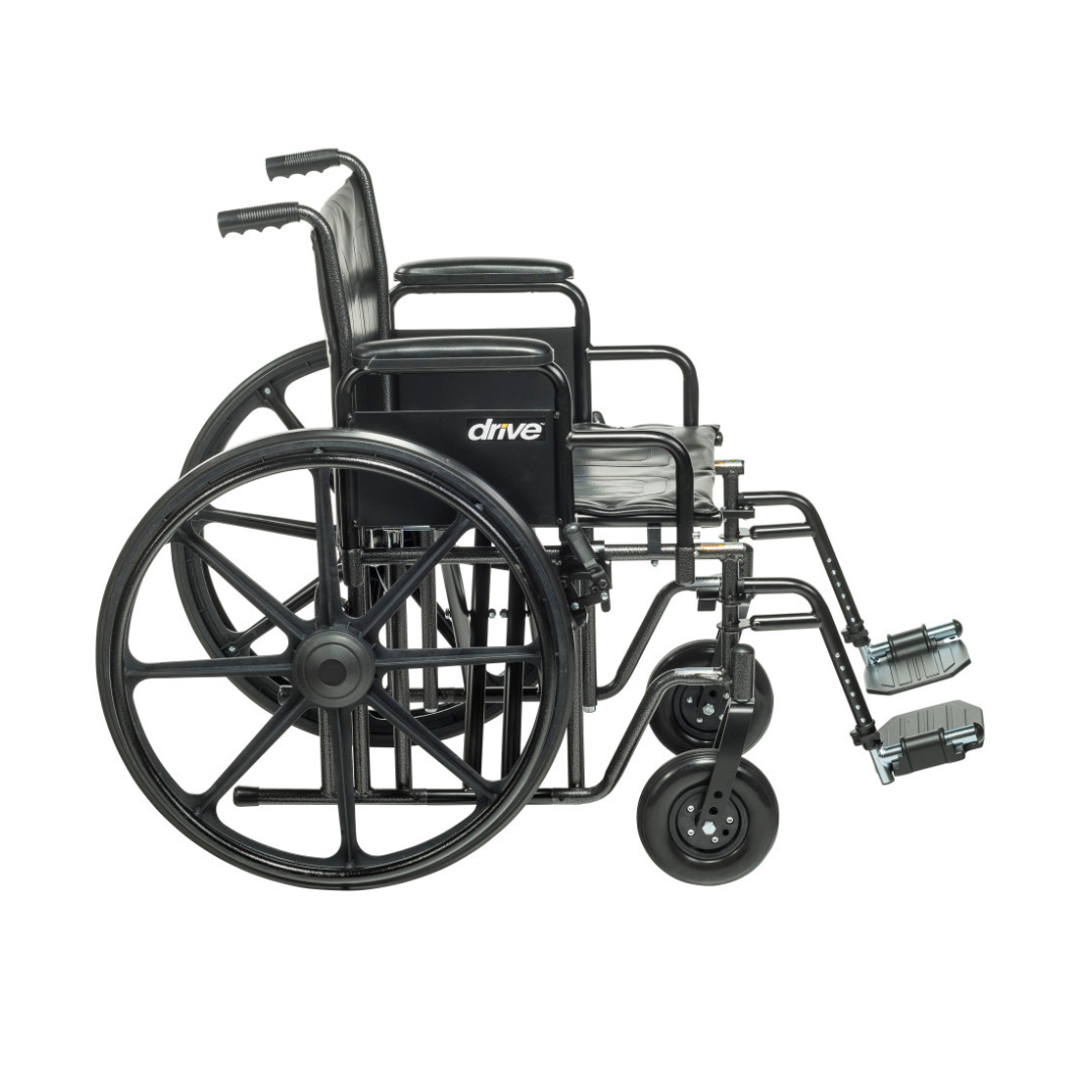 The Drive Bariatric Sentra EC Heavy-Duty Wheelchair in black features large rear wheels, small front wheels, footrests, armrests, and a 450 lb weight capacity. Shown from the side on a white background with the Drive logo visible.