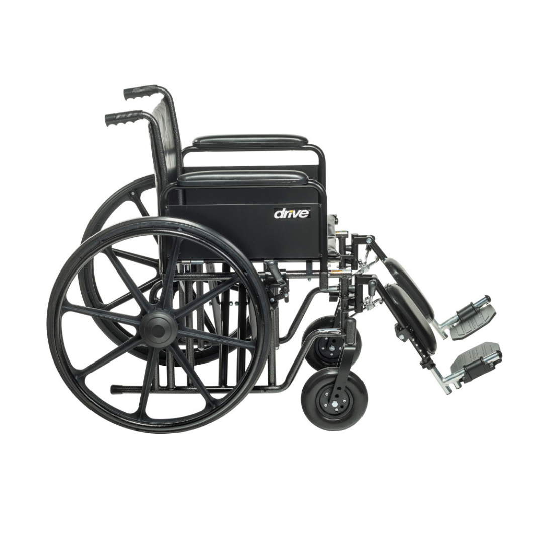 The Drive Bariatric Sentra EC Heavy-Duty Wheelchair, shown in black with large rear wheels, footrests, armrests, and a 450 lb weight capacity, is photographed from the side against a white background.