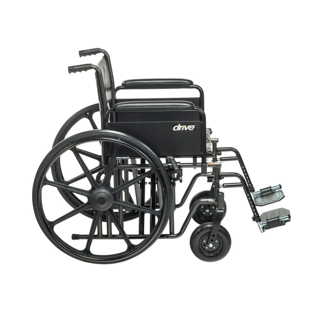 The Drive Bariatric Sentra EC Heavy-Duty Wheelchair is black, features large rear wheels, small front wheels, armrests, and footrests; shown from the side on a white background. Built for durability and supports up to 450 lbs.