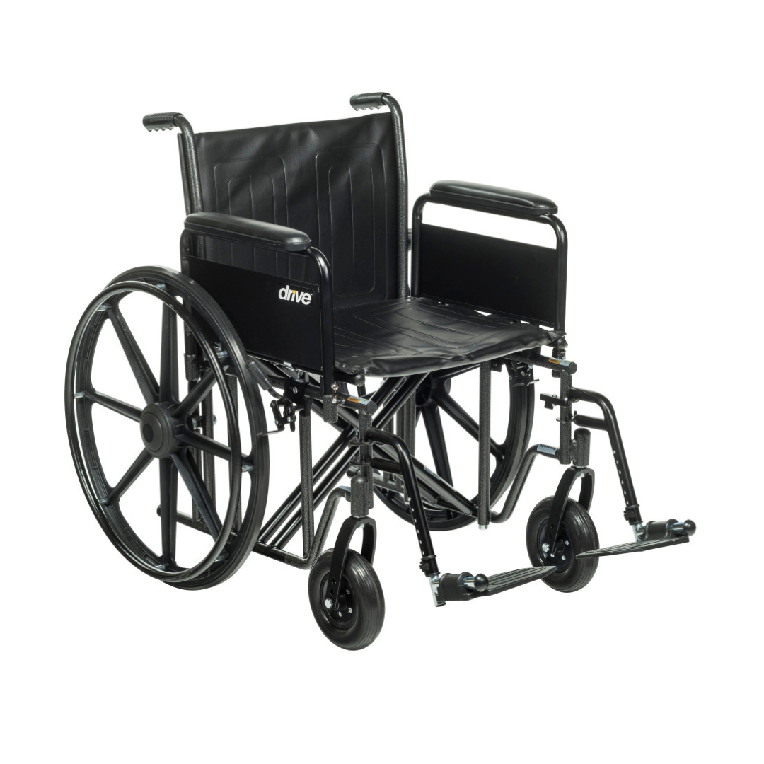 The Drive Bariatric Sentra EC Heavy-Duty Wheelchair, shown against a white background, features a black frame, large rear wheels, small front wheels, armrests, footrests, and supports up to 450 lb for enhanced support.