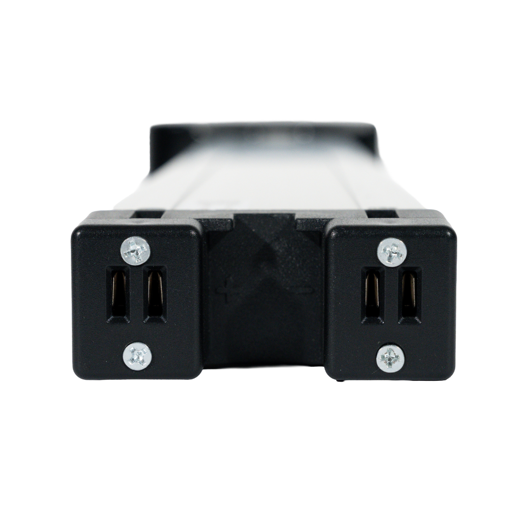 Close-up of the Battery For Forcemech Navigator Powerchair, a black rectangular device with USB ports on both ends, secured by screws, featuring a 24V 6.6Ah Lithium NCM 622 battery, shown against a white background.