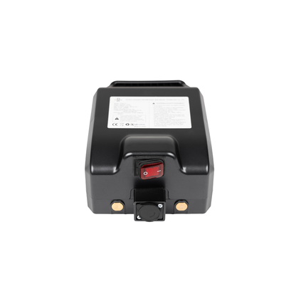 A black rectangular Battery for Forcemech Traveler Scooter with a red power switch and gold connectors on one end, placed on a white background. A white label displaying text and symbols is visible on the top.