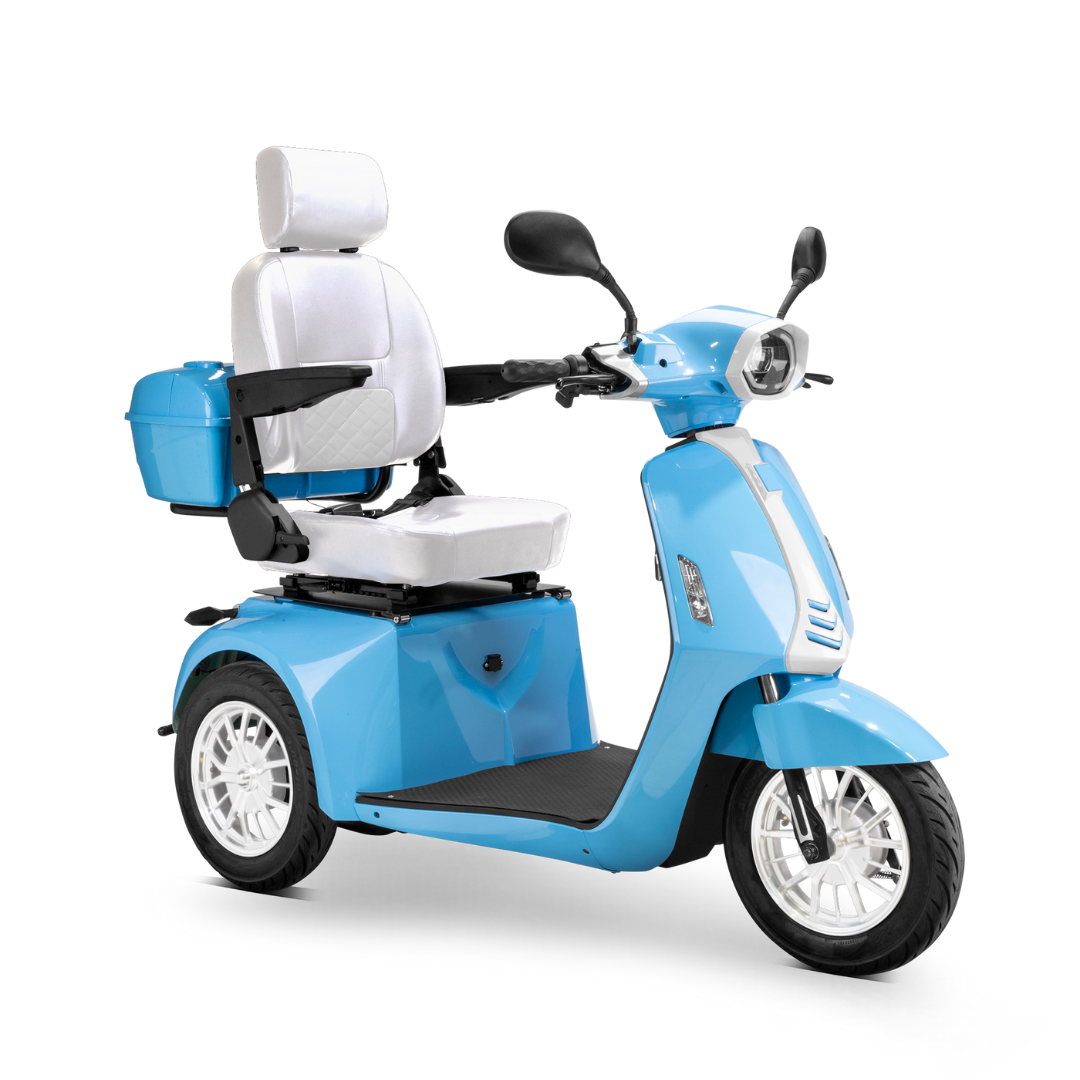 The Bespoke Elite Recreational 3-Wheel Scooter with Electric Brake Assist features a light blue body, 600W motor, white cushioned seat and headrest, side mirrors, rear storage box, and is designed for tall riders. Shown on a white background.