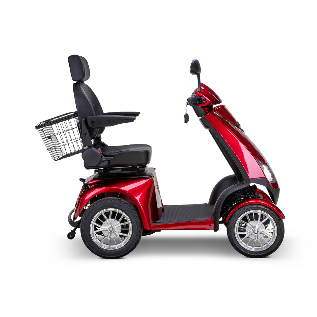 The Bespoke Platinum Recreational 4-Wheel Scooter with Electric Brake Assist, shown in profile on a white background, features a shiny red finish, padded seat with armrests and headrest, rear metal basket, and smart technology.