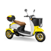 The Bespoke Supreme Euro-Style Recreational 3-Wheel Scooter with Electric Brake Assist is yellow and white, features a 600-watt motor, brown seat, front basket, rear storage box, and round handlebar mirrors, shown from a front-side view.