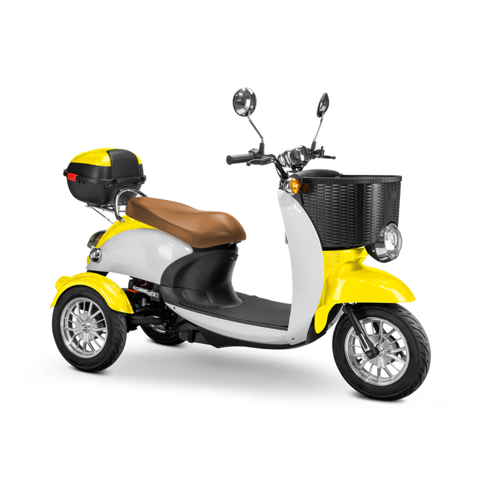 The Bespoke Supreme Euro-Style Recreational 3-Wheel Scooter with Electric Brake Assist features a yellow and white body, brown seat, black front basket, rear storage compartment, and chrome mirrors, all shown on a white background.