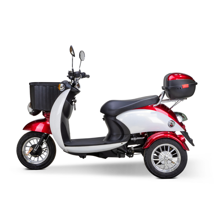 The Bespoke Supreme Euro-Style Recreational 3-Wheel Scooter with Electric Brake Assist is a red and white electric scooter (600W motor) featuring a front basket, mirrors, and rear storage box, shown in side profile on a white background.