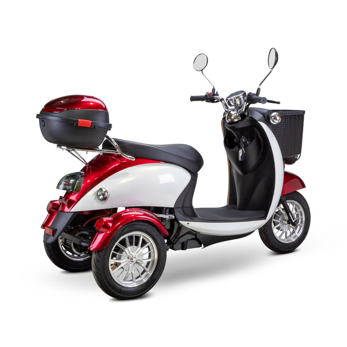 The Bespoke Supreme Euro-Style Recreational 3-Wheel Scooter with Electric Brake Assist features a 600-watt motor, red and white body, black seat, rear storage box, front basket, and two rearview mirrors, shown on a white background.