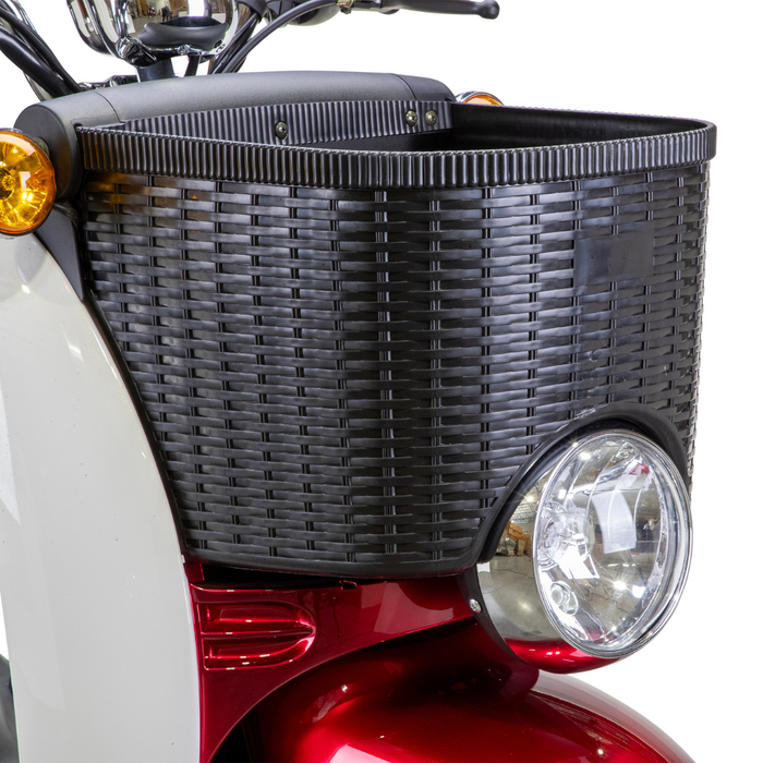 Close-up of the Bespoke Supreme Euro-Style Recreational 3-Wheel Scooter with a large black woven-style basket above the headlight. This red and white scooter features a powerful 600W motor and electric brake assist.