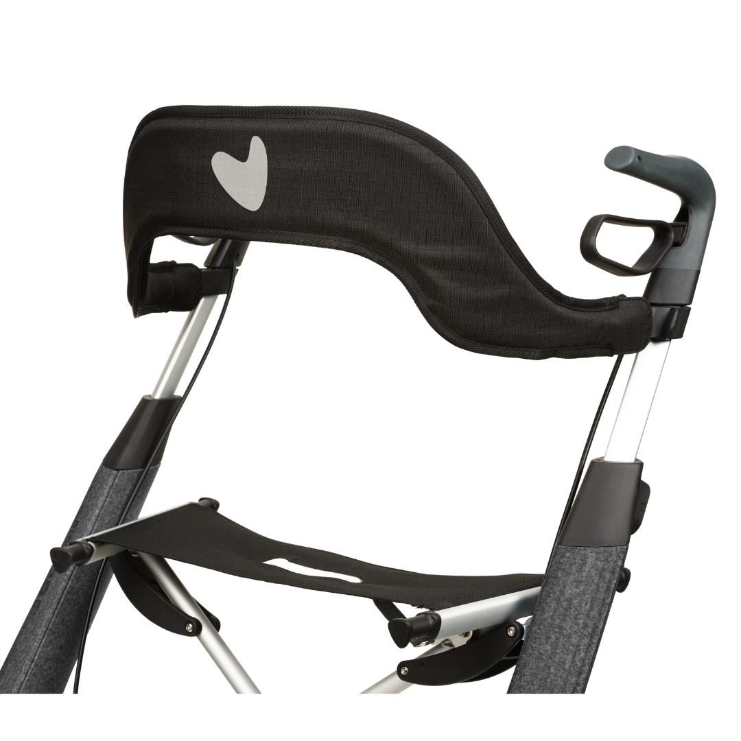 Close-up of the byACRE Nordic Pioneer Lightweight Folding Rollator – Only 13 lbs, showing its black and gray handlebar with curved backrest, cup holder, and reflective heart logo. Part of the frame and fabric seat is also visible.