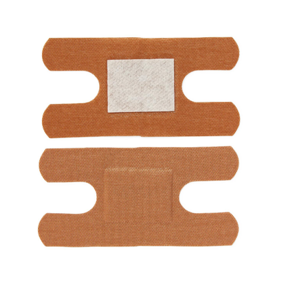 Two brown Medline CURAD Flex-Fabric Adhesive Bandages for Knuckles with H-shaped cutouts are displayed on a white background; the top reveals a white absorbent pad, while the bottom shows the adhesive side.