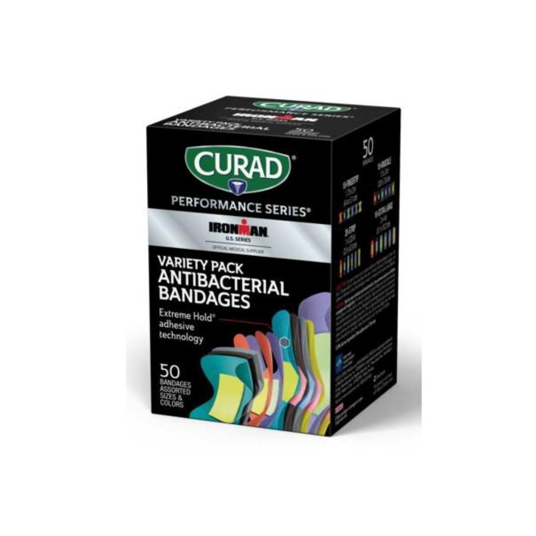 A black box of Medline CURAD Performance Series Antibacterial Bandages with the Ironman logo, showing colorful Extreme Hold bandages and highlighting 50 assorted antibacterial bandages inside.
