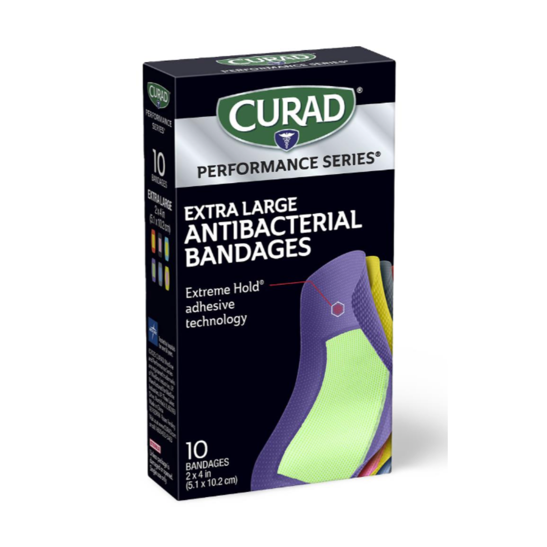 A box of Medline CURAD Performance Series Antibacterial Bandages with Extreme Hold adhesive contains 10 extra-large bandages (2 x 4 inches), and displays an illustration of the bandage.